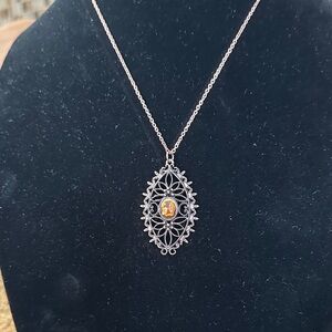 Elegant RoseGold Pendant Necklace, with center crystal and filigree.
